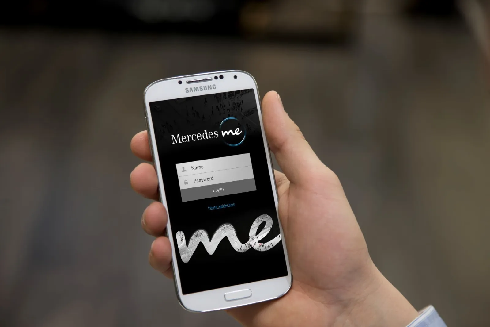 Press photo of the original Mercedes me app login screen on a Samsung phone